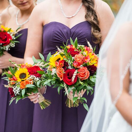 Floral Reef Designs Ottawa Florist - Jemman Photography - Bright Warm Coloured Bouquets with deep purple bridesmaid dresses