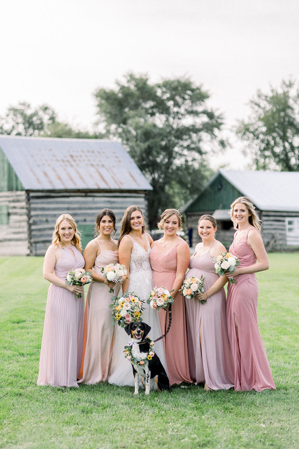 Floral Reef Designs Ottawa Wedding Florist - Amy Pinder Photography - Stonefields Estate wedding - portrait of bride and bridesmaids with puppy, all holding and wearing soft pastel bouquets