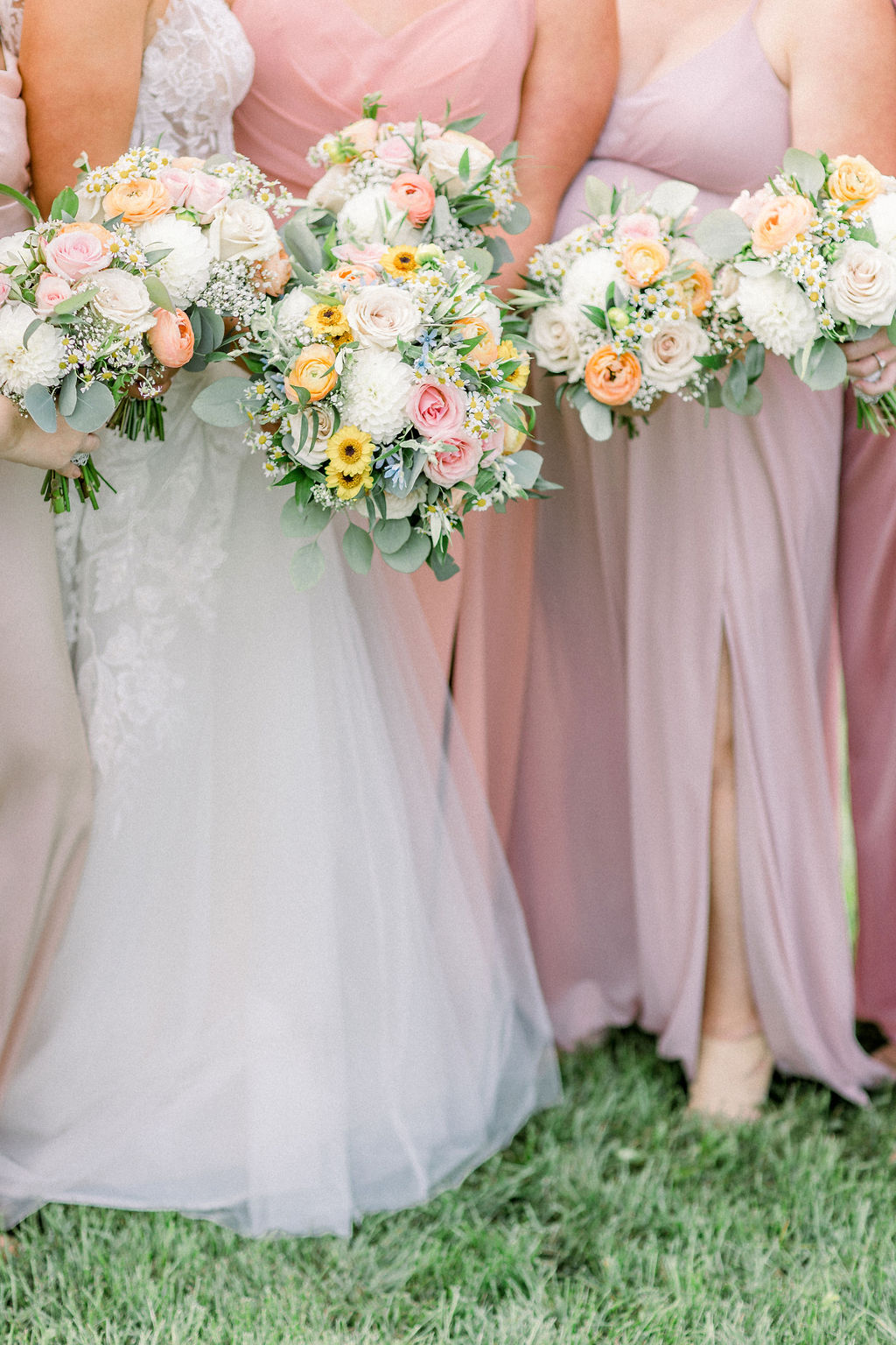 Floral Reef Designs Ottawa Wedding Florist - Amy Pinder Photography - Stonefields Estate wedding - close up of soft pastel bouquets with light pink dresses in the background