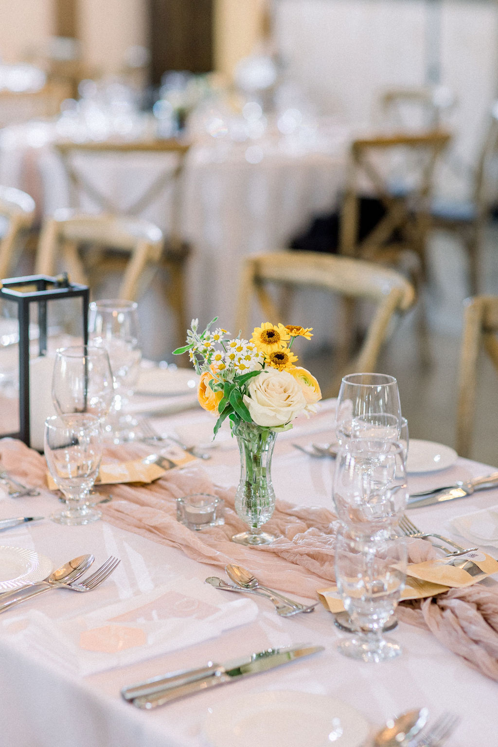 Floral Reef Designs Ottawa Wedding Florist - Amy Pinder Photography - Stonefields Estate wedding - close up on small bud vases on wedding reception dinner table holding warm toned pastel flowers
